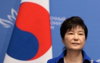 Президент Южной Кореи готова досрочно уйти в отставку после коррупционного скандала